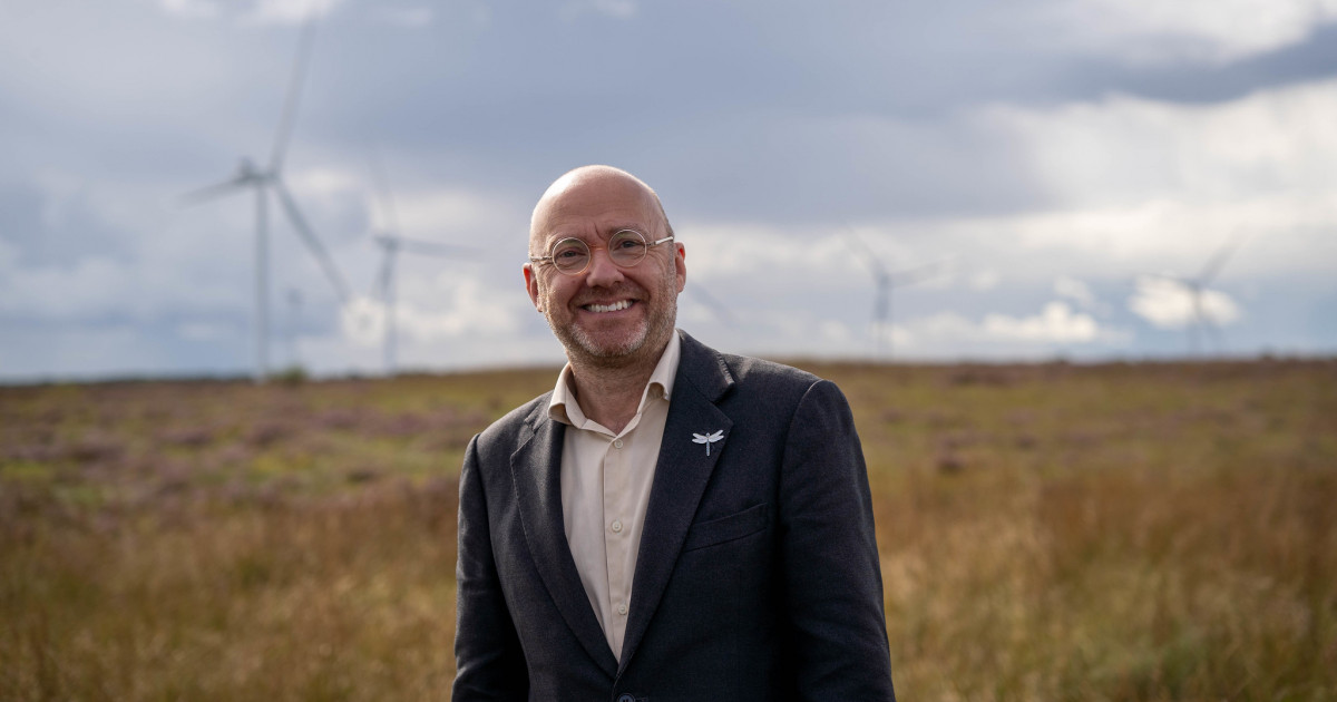 Patrick Harvie at a wind farm.
